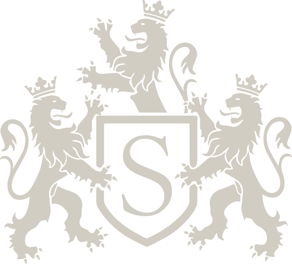 Grands crus classés Bordeaux – Maison Sichel Emblème héraldique avec lion et monogramme S, symbole des grands crus classés de la Maison Sichel